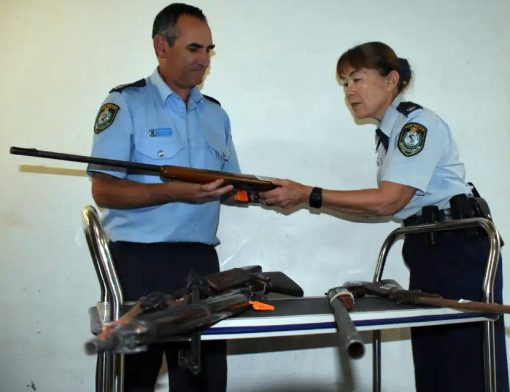 South Coast Police District exhibits officer at Nowra Police Station Senior Constable John White and Inspector Sue Charman-Horton with some of the guns handed in during the recent amnesty.