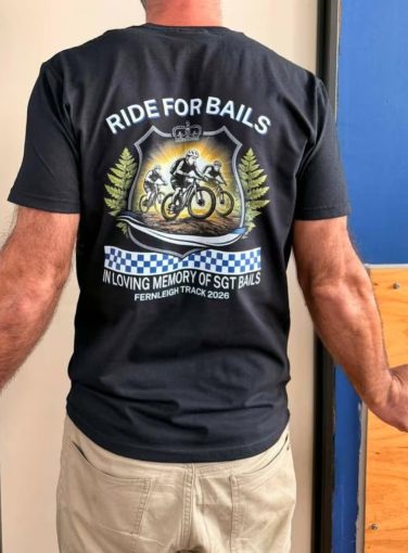 Mitch wearing the shirts designed for the ride in honour of Bails . Picture: Supplied