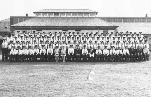 New South Wales Police Historical SocietyMark Russell · · My first class number was Class 115. Secondary Training commenced 1/04/69 to 9/05/69. There was 2 Police Women in this class and 4 Railway Detective Police ( however I think only 3 are in the photo ). Me, I'm front row eighth from the right. I turned 19 just one week from being sworn in. A good mate of mine at the time was David Reiher. He is seated three to the left of me ( my left) . We did our training together and we also did the bike course together at St Ives. Sadly he was struck my a ute down in Wollongong on the 21st December 1969 and passed away. A wonderful friend with a great sense of humour. Many years later I stopped a car coming off Taren Point Bridge which had disobeyed a red light. After writing up the ticket with the driver having the same surname as Dave, I asked him if he ever knew a police officer named Dave Reiher. He replied, "That was my son". That is the worst I have ever felt in issuing a ticket. He was so gracious after I told him of our association many years back and accepted the fine with absolute grace. I still felt like shit.