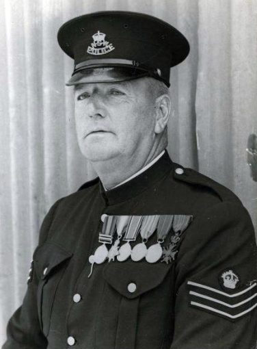 Policeman J. J. Walsh, in uniform with medals