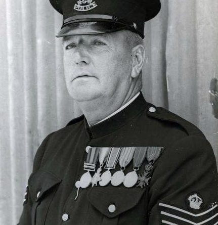 Policeman J. J. Walsh, in uniform with medals